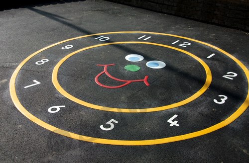 Photo of playground marking/equipment - Smiley Clock Face | Nursery and Reception / School playground markings / Primary schools / Number